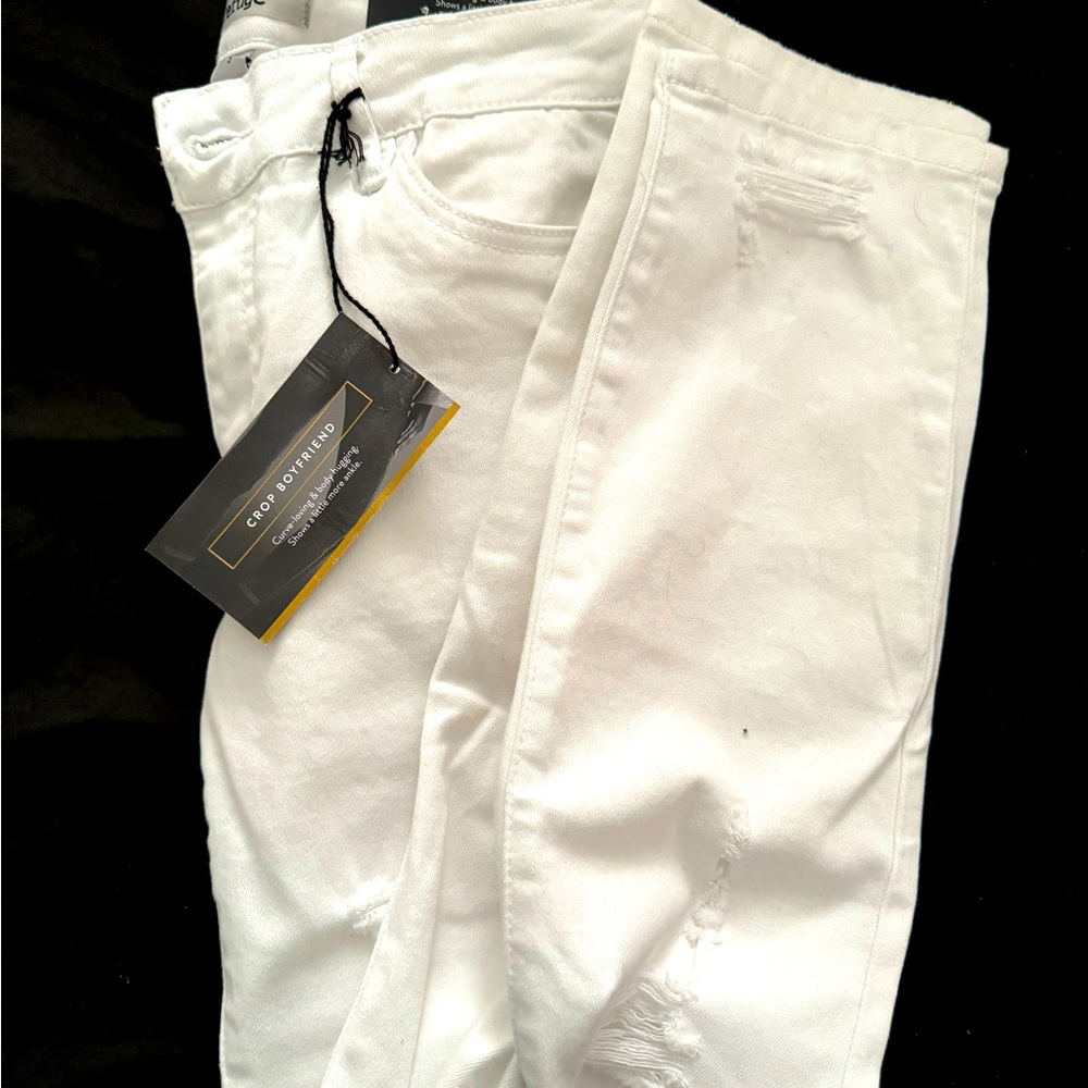 Brand new. Never worn. Size 2. White.
